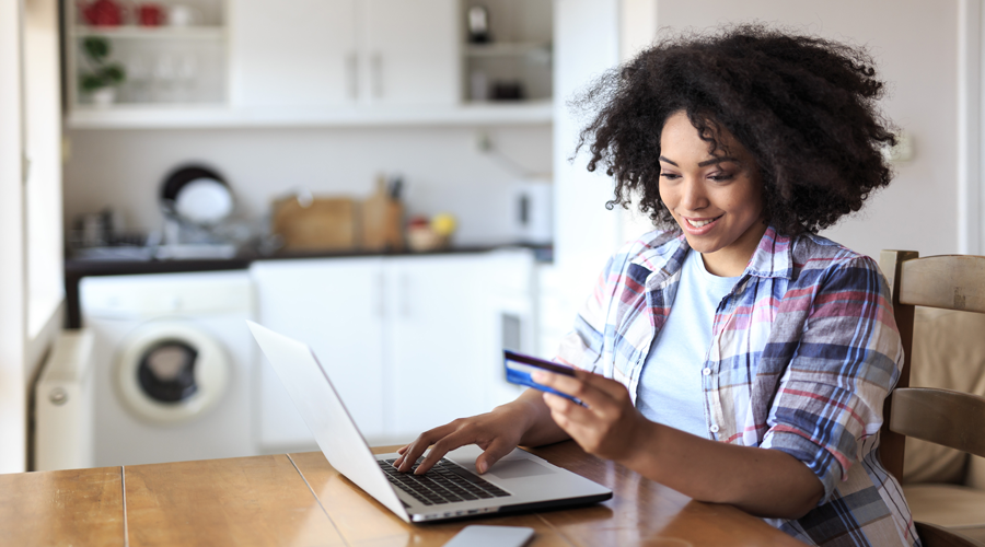 Young female making online purchase